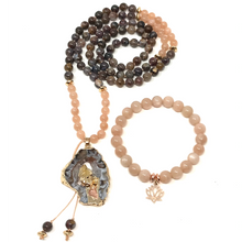 Load image into Gallery viewer, Sunstone with lotus flower